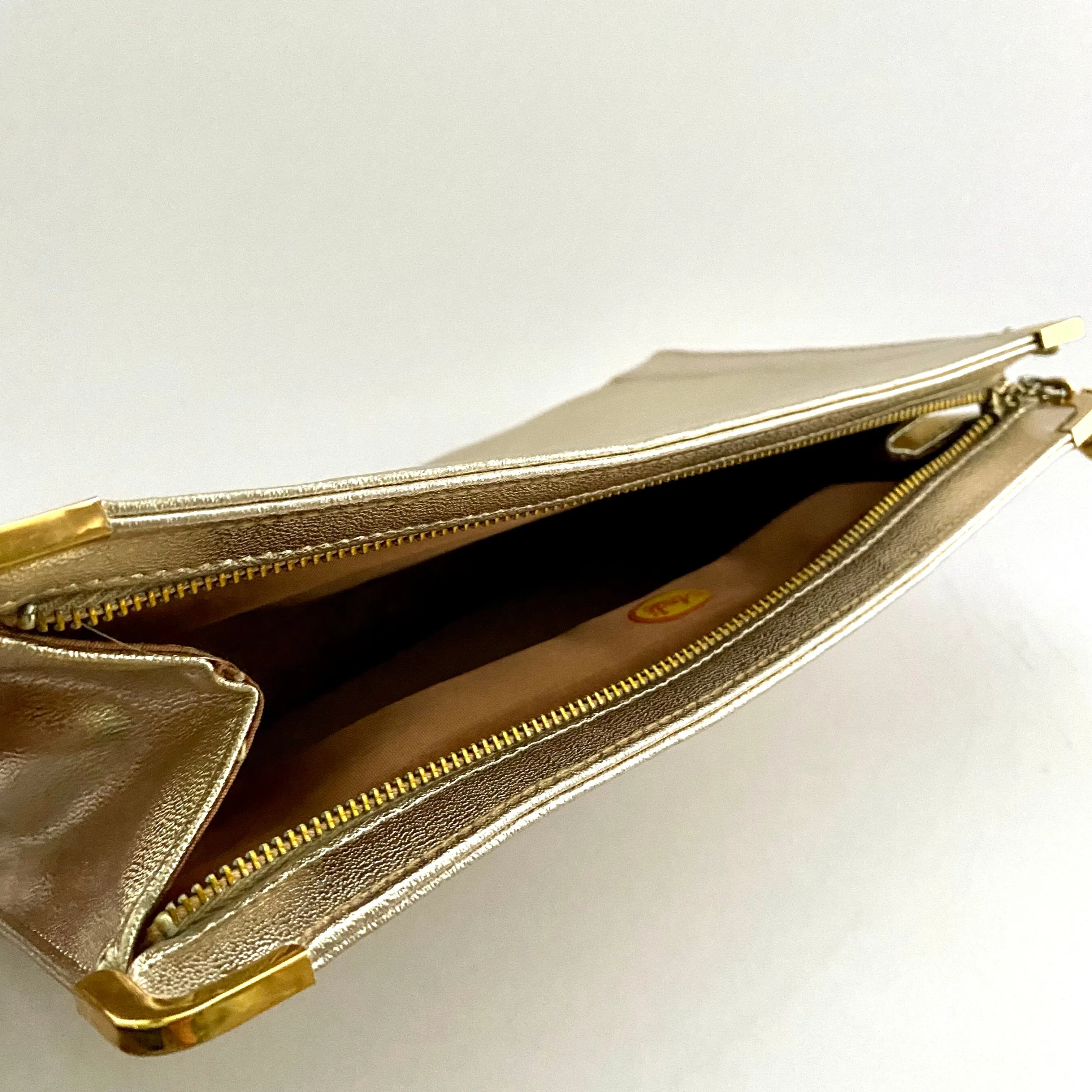 1960s Andé Metallic Pale Gold Wristlet Clutch